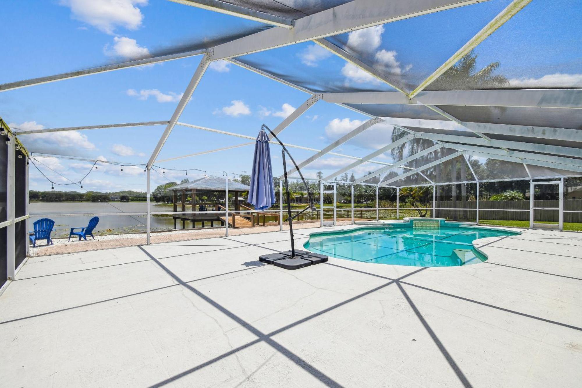 House Westchase Area. Heated Pool Waterfront!